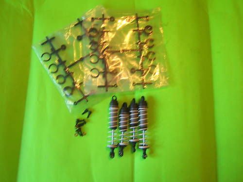 NEW TRAXXAS SLASH COMPLETE SHOCK (4) SET  