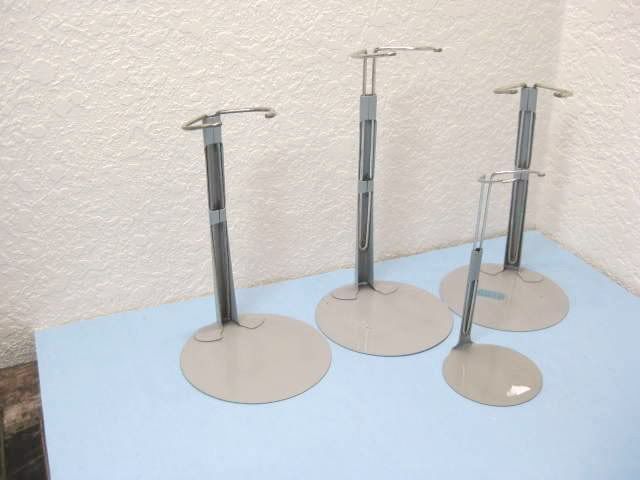 Lot of 4 Doll Holder Stands (8.5 tall & 12 tall)  