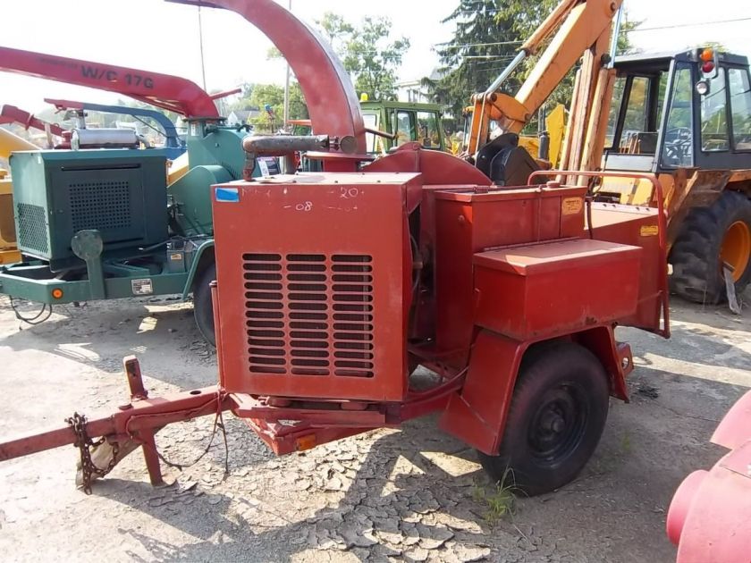 Morbark wood chipper ford ind. gas motor , 10 log, hdy feed  