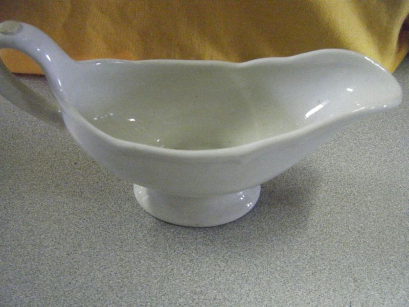 very nice small vintage white ceramic gravy boat  